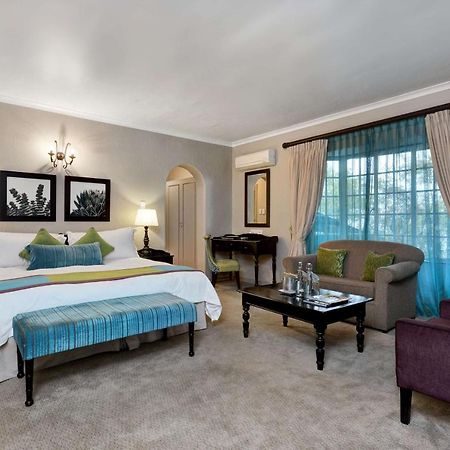 Mount Grace Hotel & Spa Magaliesburg Luaran gambar A bedroom at the Taj Bengal